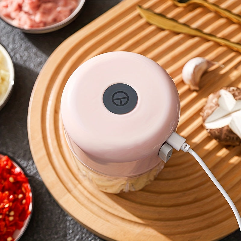 3-color options, compact electric garlic press for home and restaurant use with stainless steel blades, quickly crushes garlic and ginger, ideal for various food preparations